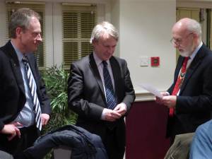 Jeremy Burchill being inducted by President John Morton, with Sponsor Michael Hepper